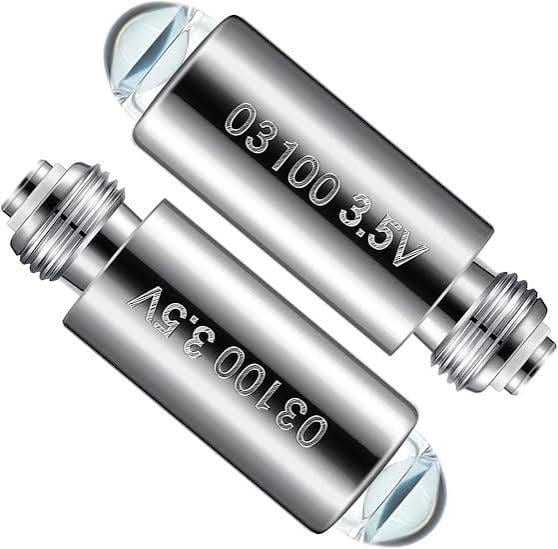 Two silver replacement bulbs marked 03100 3.5V, lying side by side